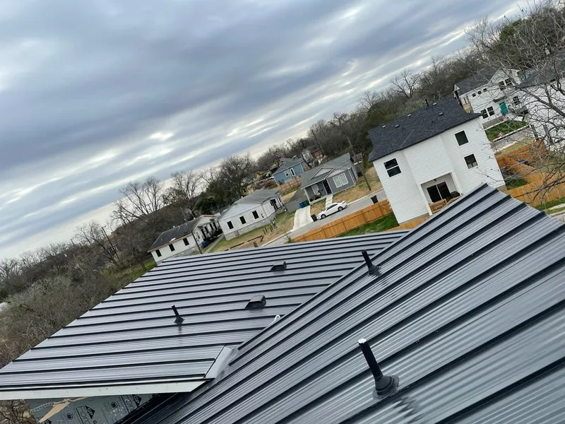 Standing seam metal roof panels with vents for Skylight Repair in Livingston